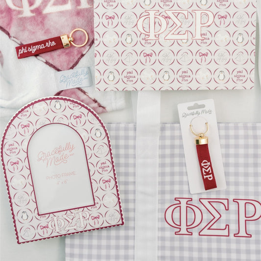 Phi Sigma Rho themed products including a keychain, art print, and tote bag on a white background.