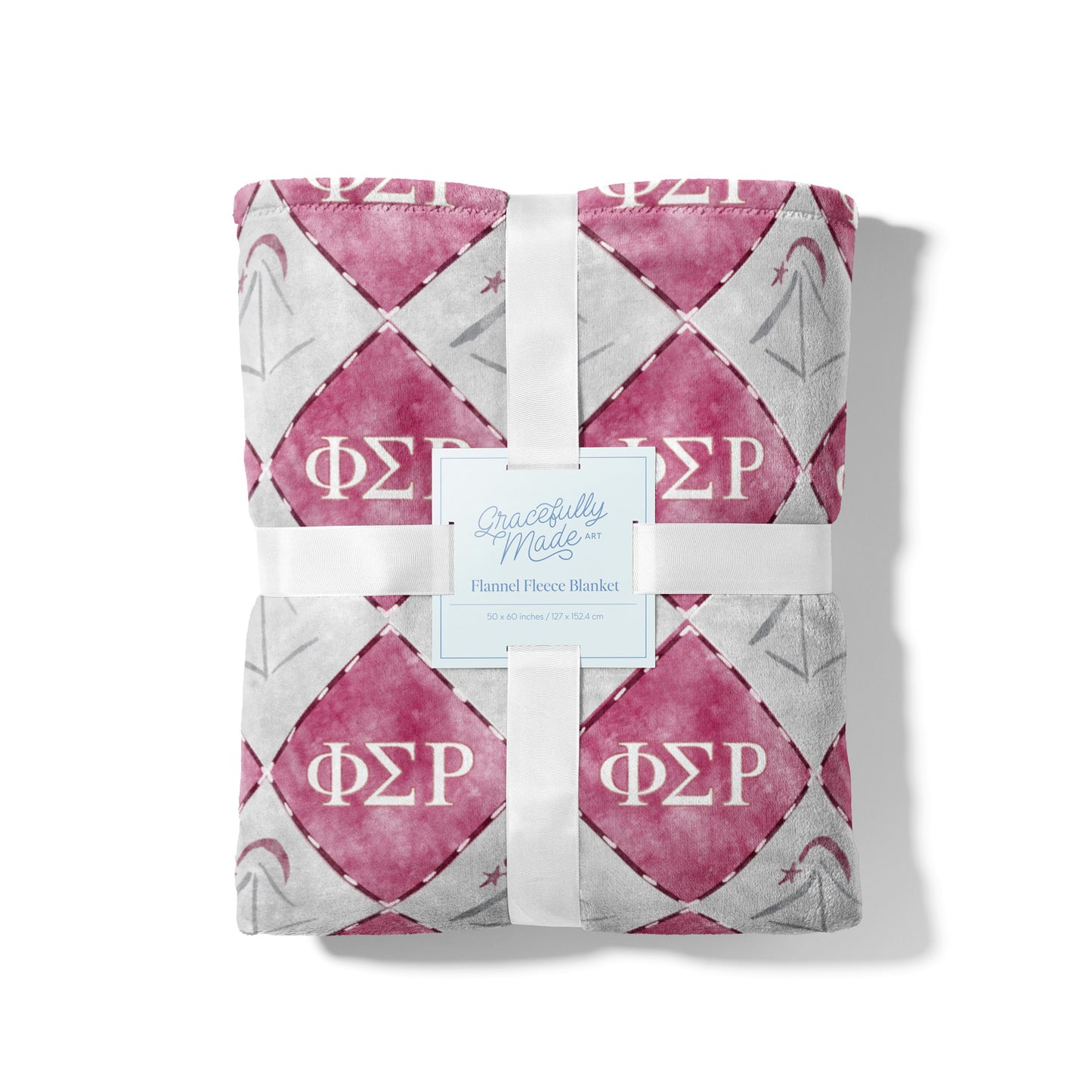 Folded pink and gray blanket with Phi Sigma Rho Greek letters on a white background