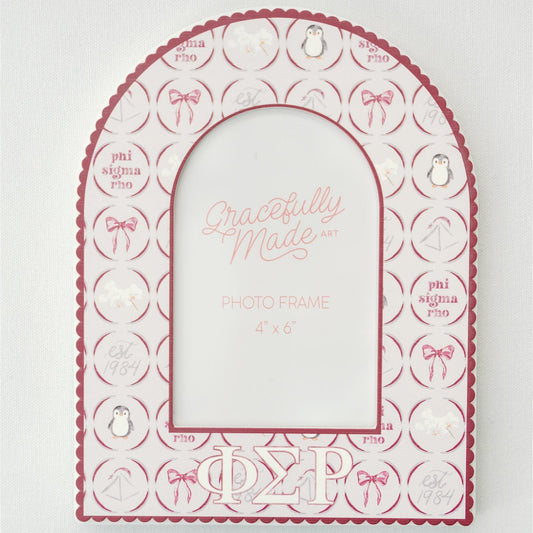 Decorative photo frame with Phi Sigma Rho Greek letters and Gracefully Made Art branding on a white background