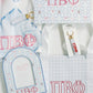 Collection of Pi Beta Phi merchandise including a picture frame, keychain, and tote bag on a white background.