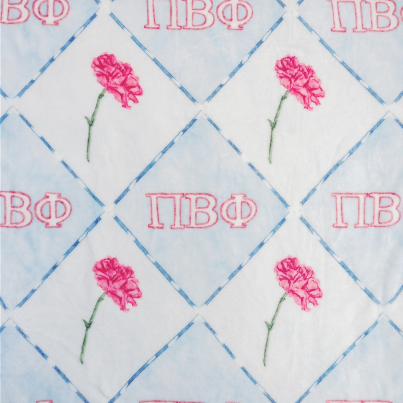Embroidered fabric with pink flowers and 'ΠΒΦ' letters on a blue checkered background.