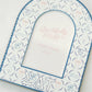 Decorative photo frame with circular patterns and Sigma Delta Tau Greek letters on a white background