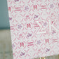 Decorative art print with Sigma Kappa design and Greek letters on a stand against a light blue background