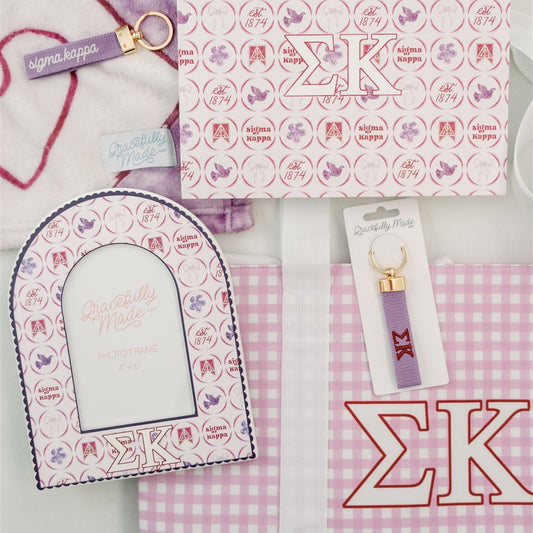 Collection of decorative items with 'Sigma Kappa' Greek letters on a checkered background