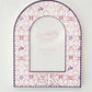 Decorative photo frame with Sigma Kappa Greek letters and watercolor pattern on a white background.