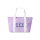 Tote bag with purple gingham pattern and Sigma Sigma Sigma Greek letters on a white background