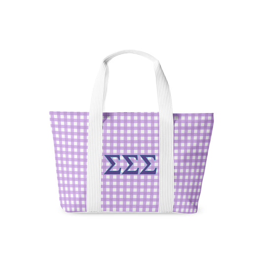 Tote bag with purple gingham pattern and Sigma Sigma Sigma Greek letters on a white background