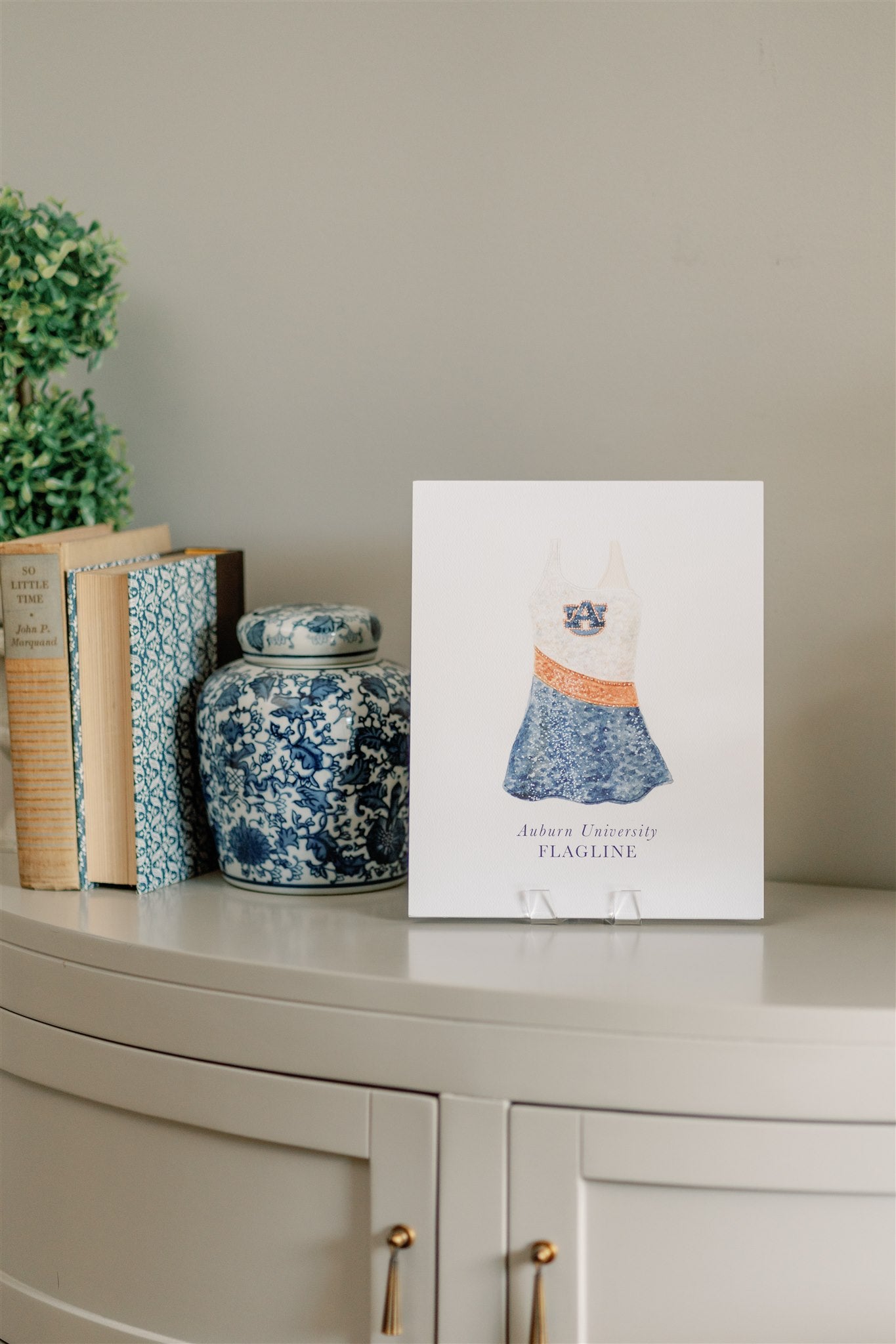 Watercolor art of the Auburn University Tiger Eyes Flag Uniform