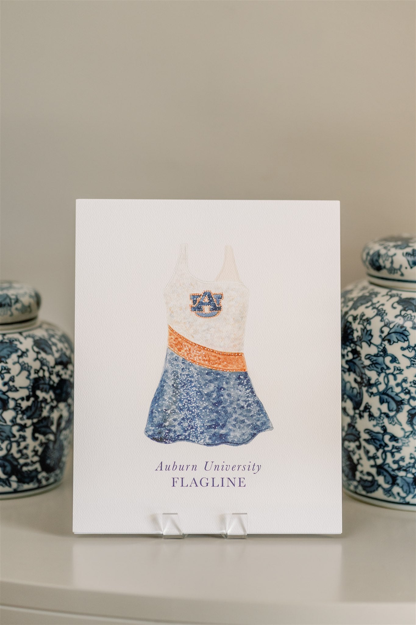Watercolor art of the Auburn University Tiger Eyes Flag Uniform