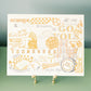 Decorative poster with 'GO VOLS' and other text on a stand on a green dresser