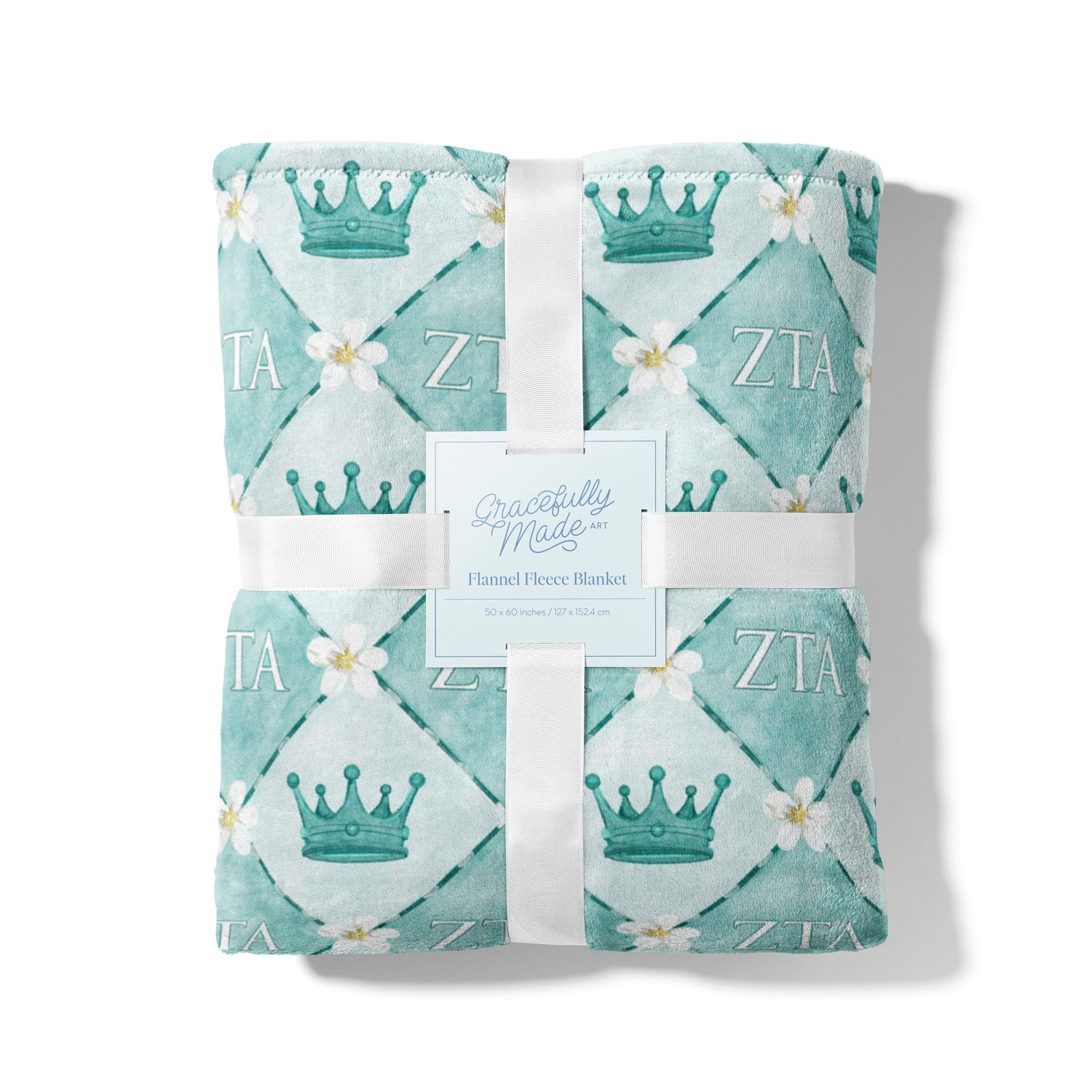 Blue checkered fleece blanket themed to Zeta Tau Alpha sorority packaged with white ribbon.