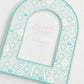 Teal and white decorative photo frame with Zeta Tau Alpha Greek letters on a white background